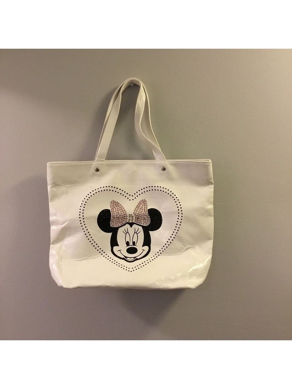 Disney Woman’s tote featuring Minnie Mouse with magnetic snap closure